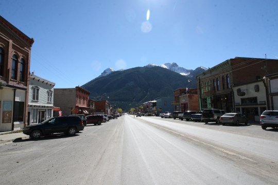 Historic Silverton, CO: the side street that parallels this main street is a dirt road equipped with hitching posts to tie up your horse outside the businesses. Dogs are welcomed in this town by water dishes on the sidewalks outside most establishments.