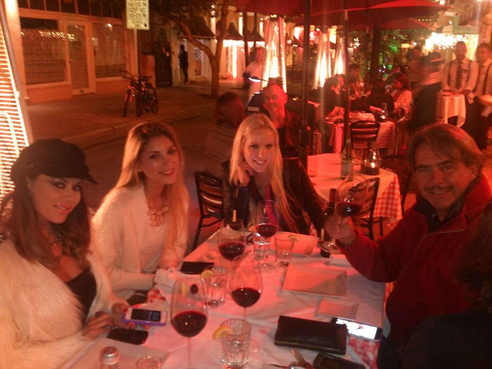 Fur coats and parkas under the heat lamps in Miami, Florida. Nov. 1, 2014.